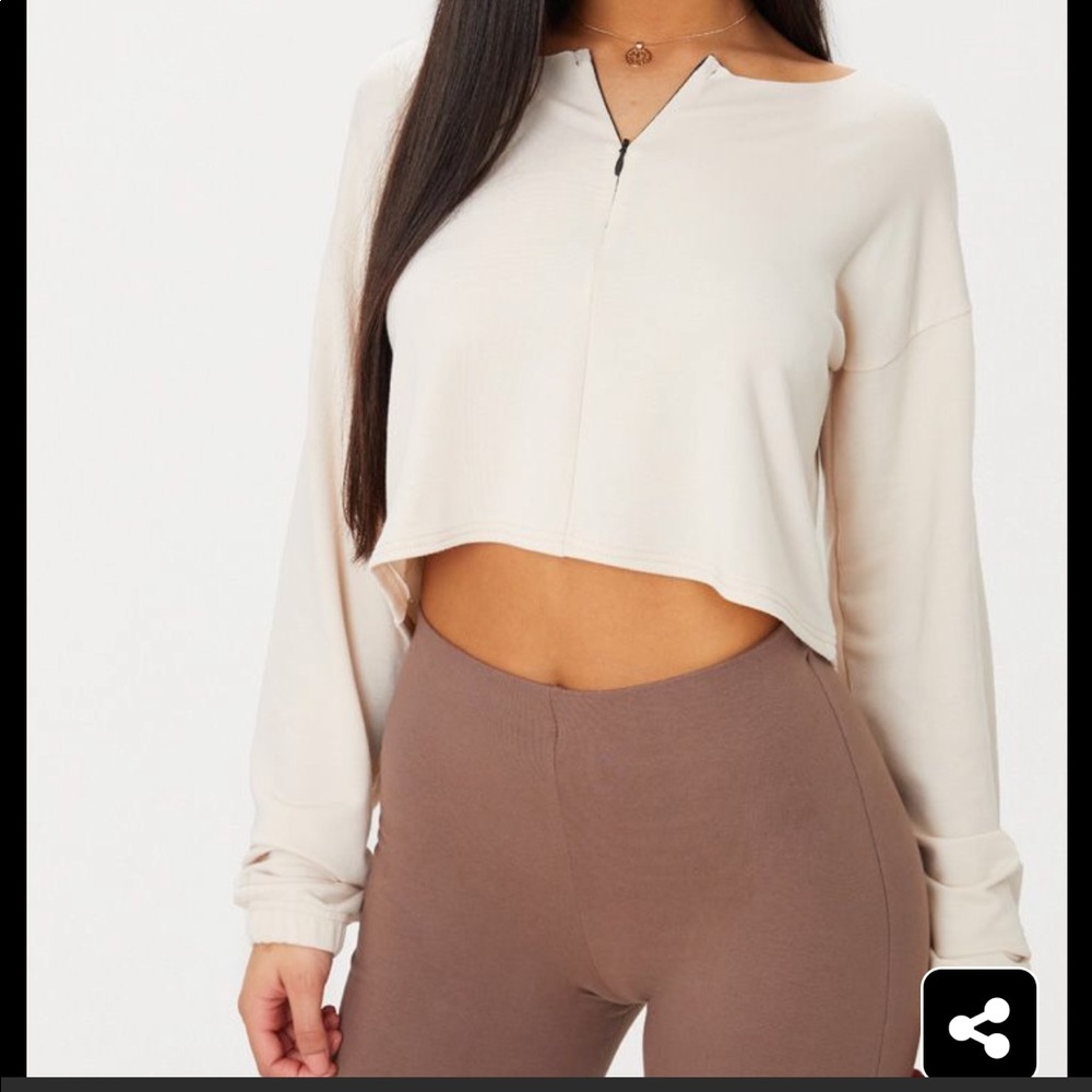 Cream zip front sweater